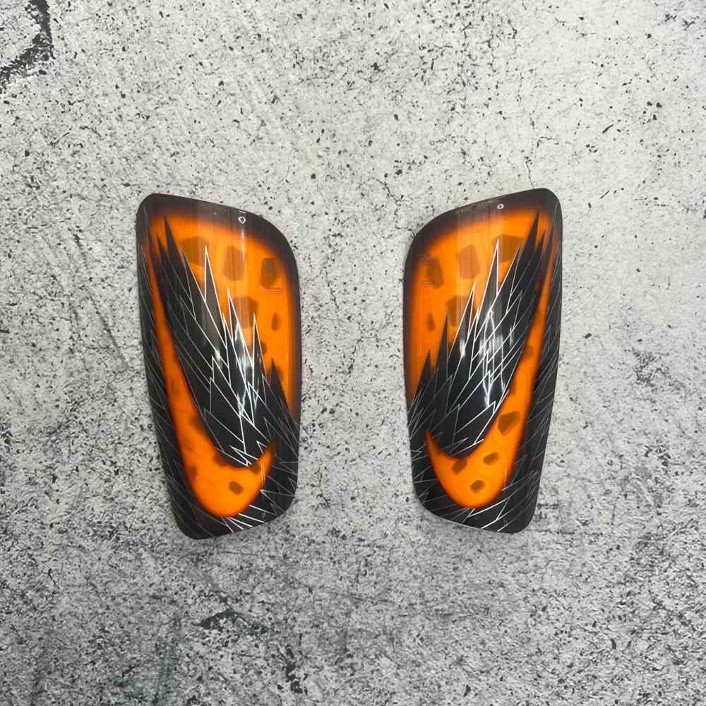 Щитки Nike Mercurial Lite orange wings #1