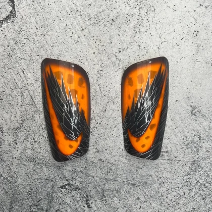 Щитки Nike Mercurial Lite orange wings